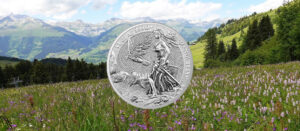 La moneda de plata Germania de 2023, sobre un frondoso pradero de Alemania