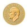 Perspectiva frontal de la cara de la moneda de oro Britannia de 1/4oz de 2024, con el rostro en perfil del monarca Carlos III