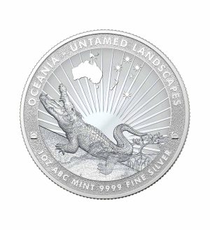 Perspectiva frontal de la cruz de la moneda de plata Cocodrilo de 1oz de 2024 de la colección Paísajes Indómitos de ABC Mint, que muestra al animal sobre un terreno árido