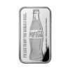 Lingote-de-plata-Coca-Cola-de-1oz Perspectiva frontal del anverso del lingote de plata Coca Cola de 1oz de 2024, que muestra la icónica botella de la bebida azucarada