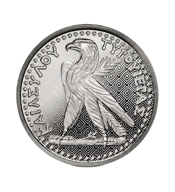 Perspectiva frontal de la cruz de la moneda de plata Shekel de Tyre de 1oz de 2024, con la imagen del anivel de lado junto a tipologría griega