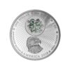 Perspectiva frontal de la cara de la moneda de plata policromada Stonehenge de 1oz de 2025, que muestra al águila norteamericana rodeada de las características de la pieza