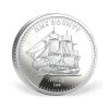 Perspectiva frontal de la moneda ded plata HMS Bounty de 1oz de 2026, que muestra el buque navegando por el mar